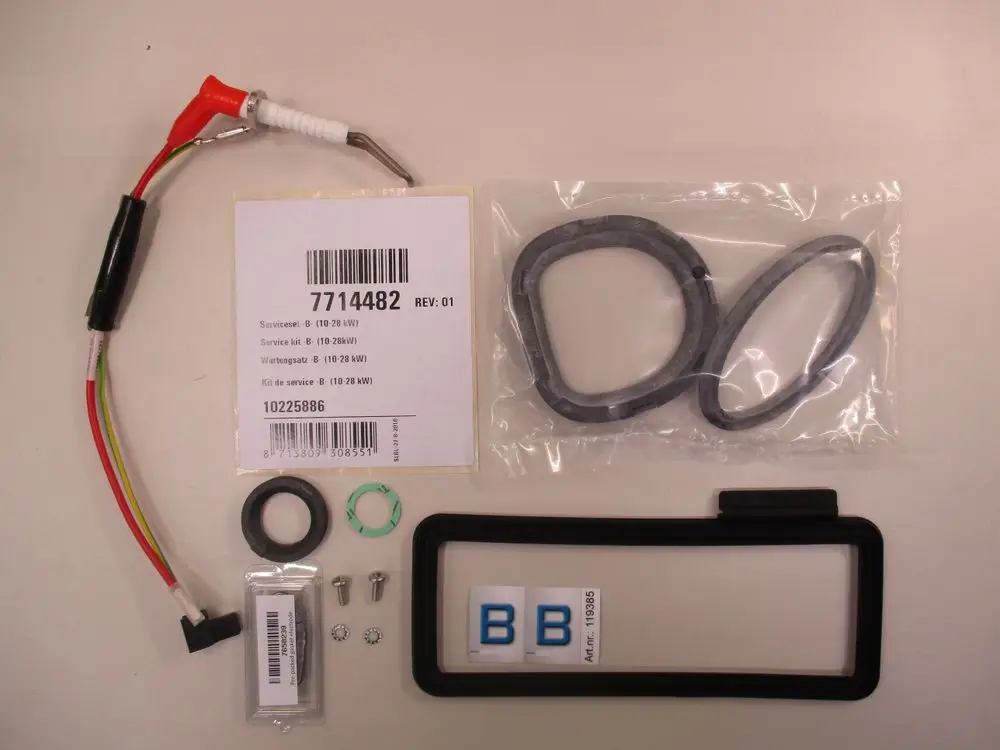 Wartungssatz von Remeha mit Kabel, Dichtungen, Schrauben und Halterung, verpackt in einer Tüte, zur Verwendung in Heizsystemen.